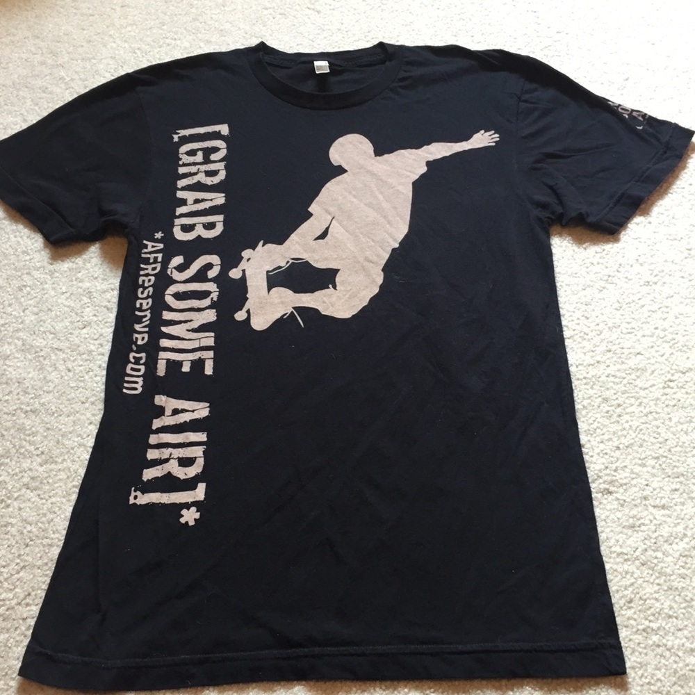 The summer shirt apparel size Medium grab some air
